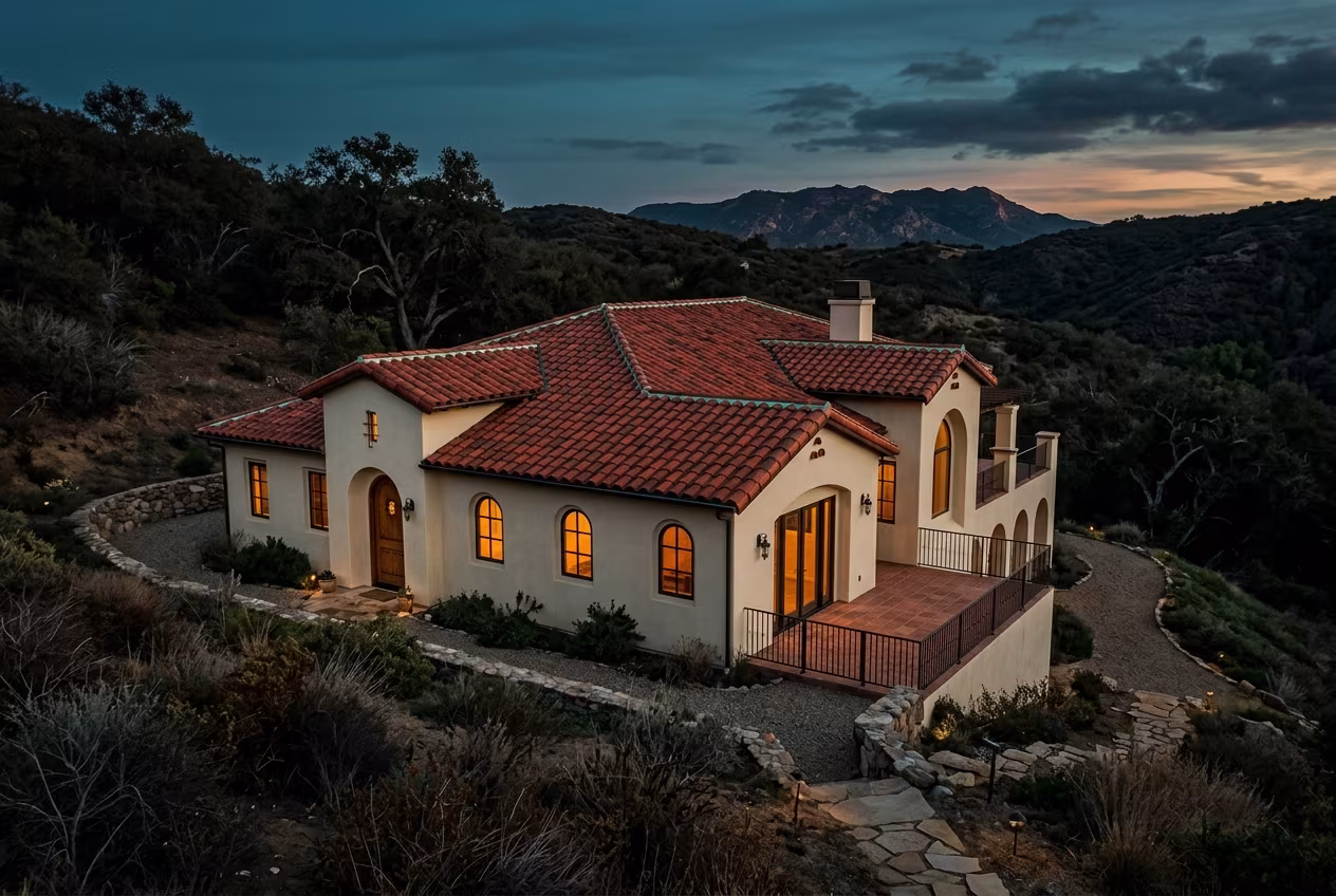 Class A roof in Woodland Hills: clay tile on a hillside home at dusk